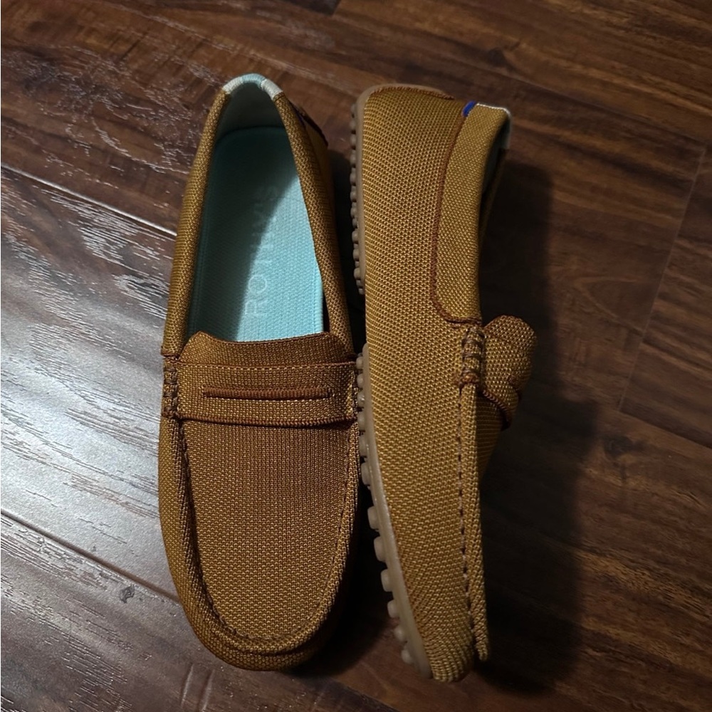 Rothy’s The Driver in solid Marigold. Showroom condition